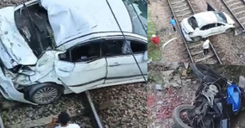 high speed car breaks flyover railing and falls on railway track
